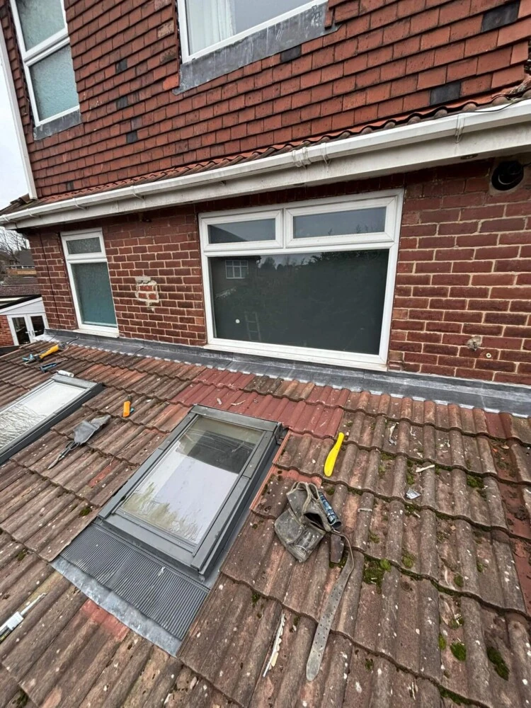 Red brick house with new uPVC fascia and guttering fitted